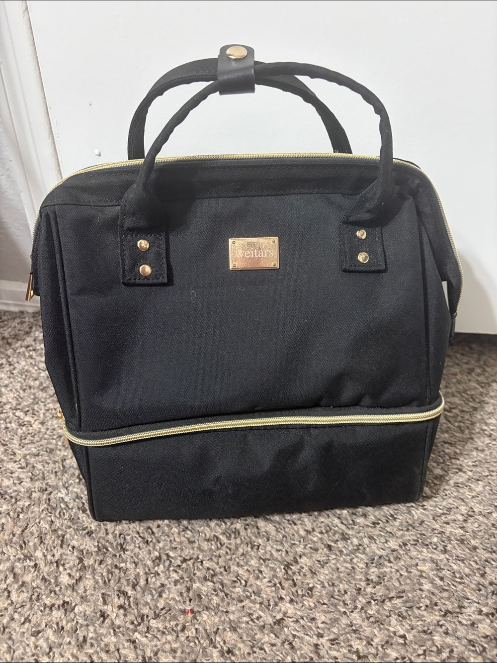 Black and Gold Lunch Bag with charging cord